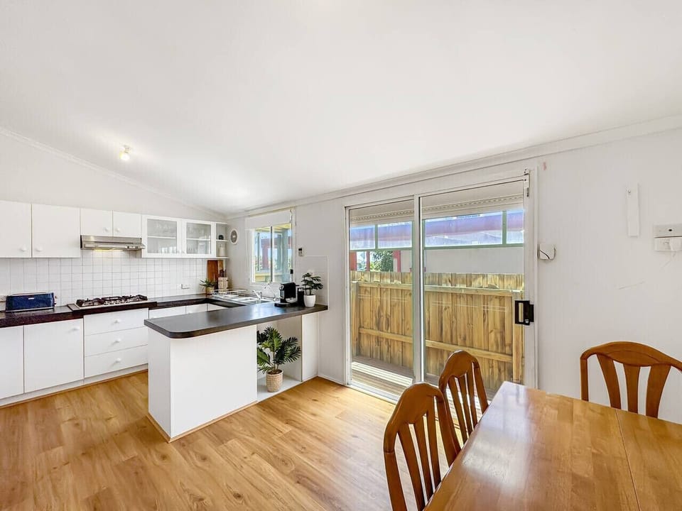 Kitchen & adjoining meals area with seating for 4