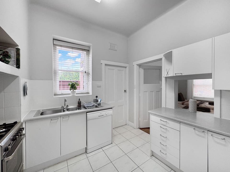 Kitchen with dishwasher & access to your own private courtyard