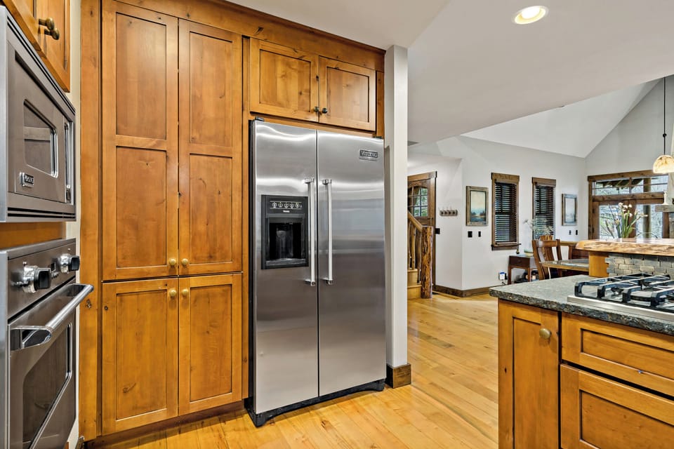 Kitchen with gas range, dishwasher, drip-style coffee maker, and Keurig coffee maker