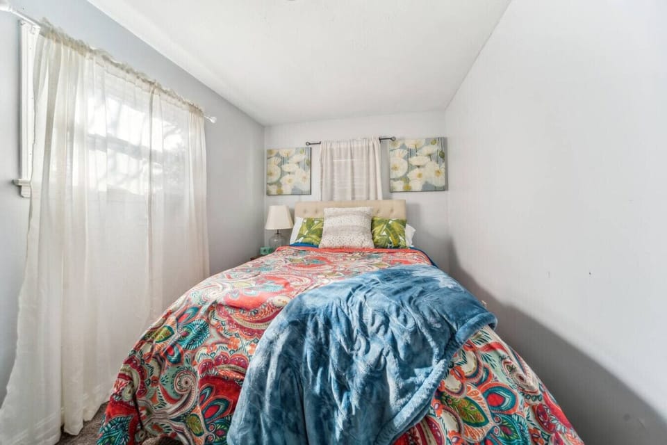 Relax in the comfortable queen bed in the second bedroom.
