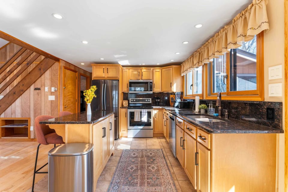 Whip up your favorite dishes with ease in our well-equipped, fully stocked kitchen.