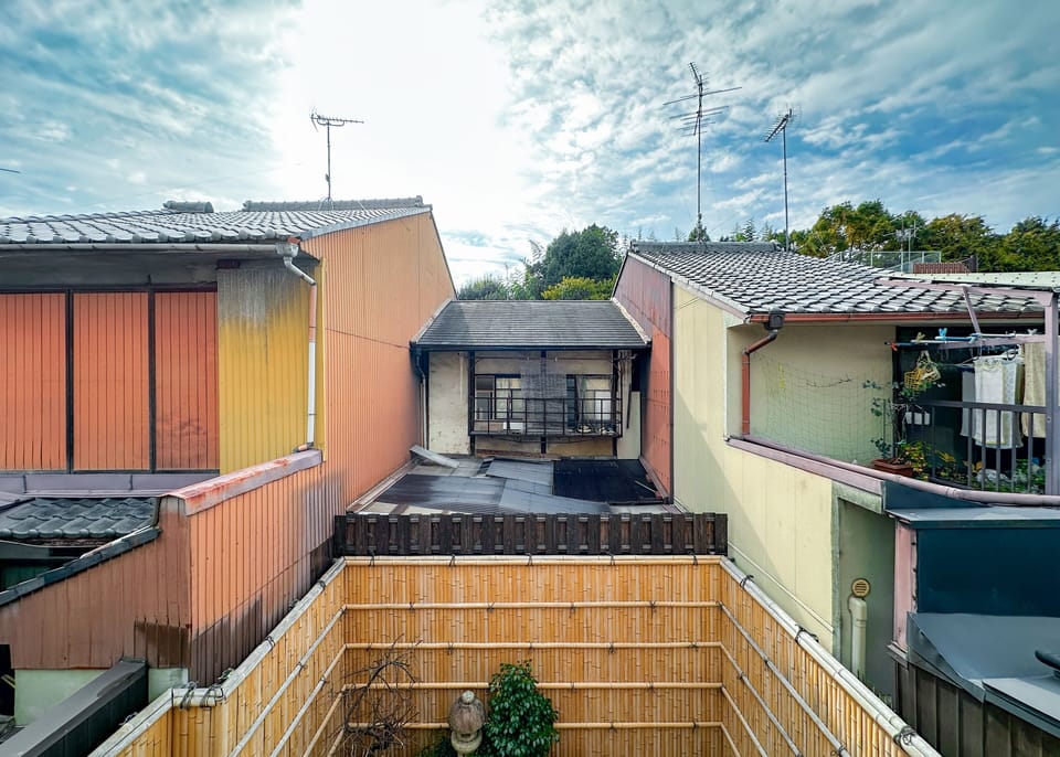 View from window (neighborhood and hill)