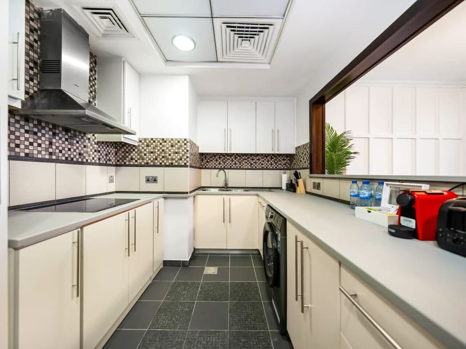 Enjoy the convenience of a modern kitchen, complete with all essentials for your stay.