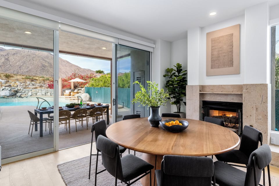 Dining for 8 next to yet another fireplace!