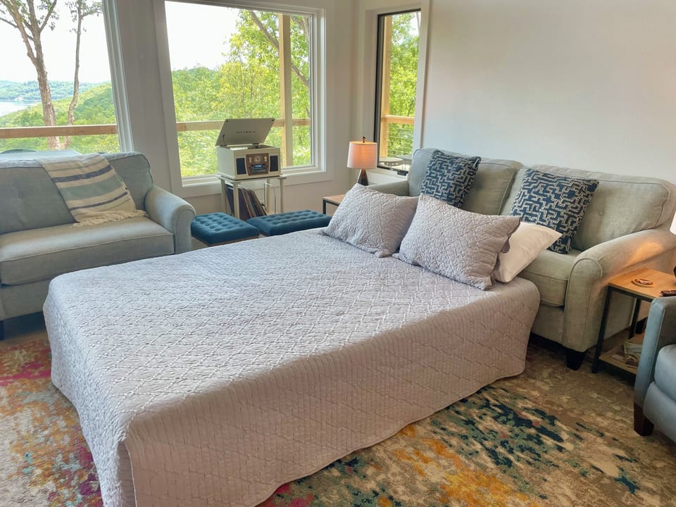 Portable Queen bedframe and memory foam mattress.  (not a pull-out sofa)