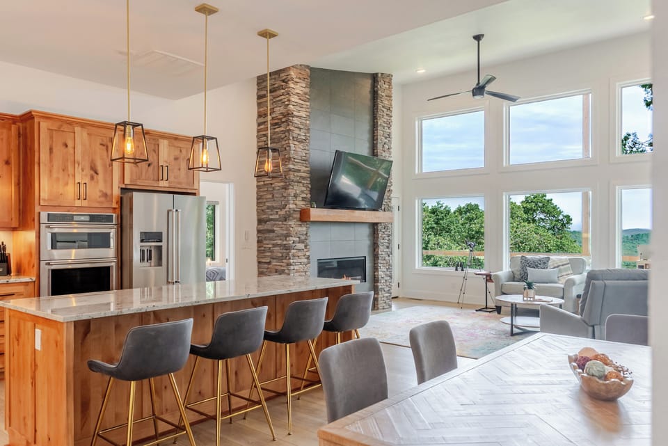 Dining area, kitchen and living room.