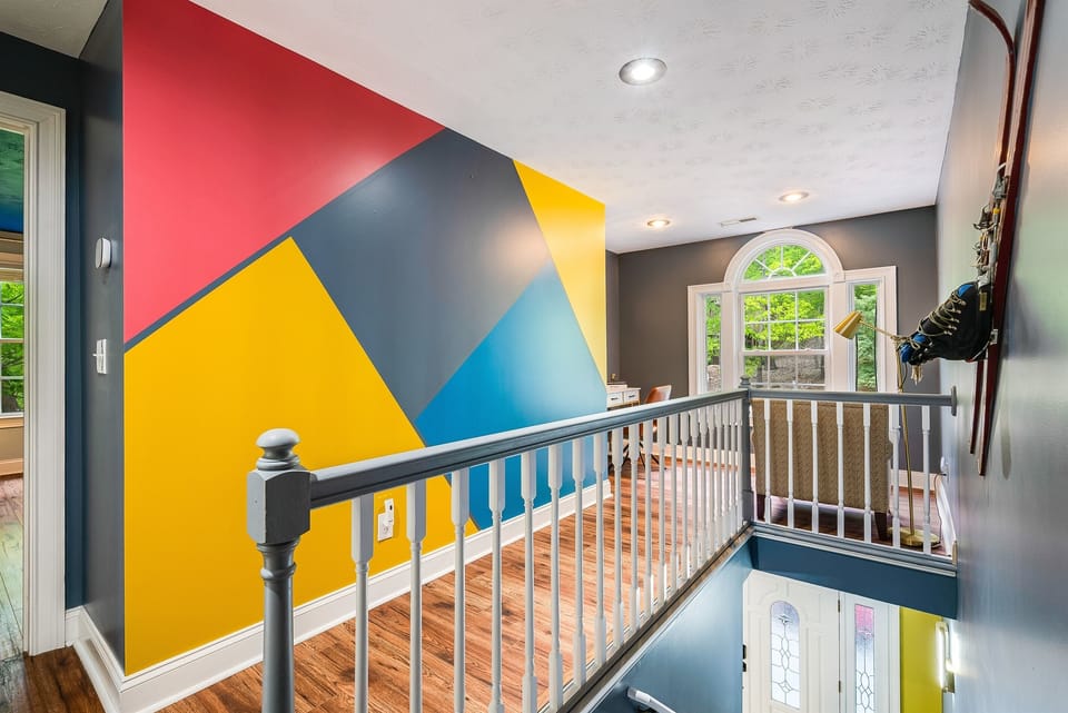 Cheerful design greets you on the way to bedrooms and the upstairs lounge.