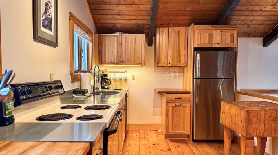 A modern and welcoming kitchen, perfect for preparing meals and making memories.