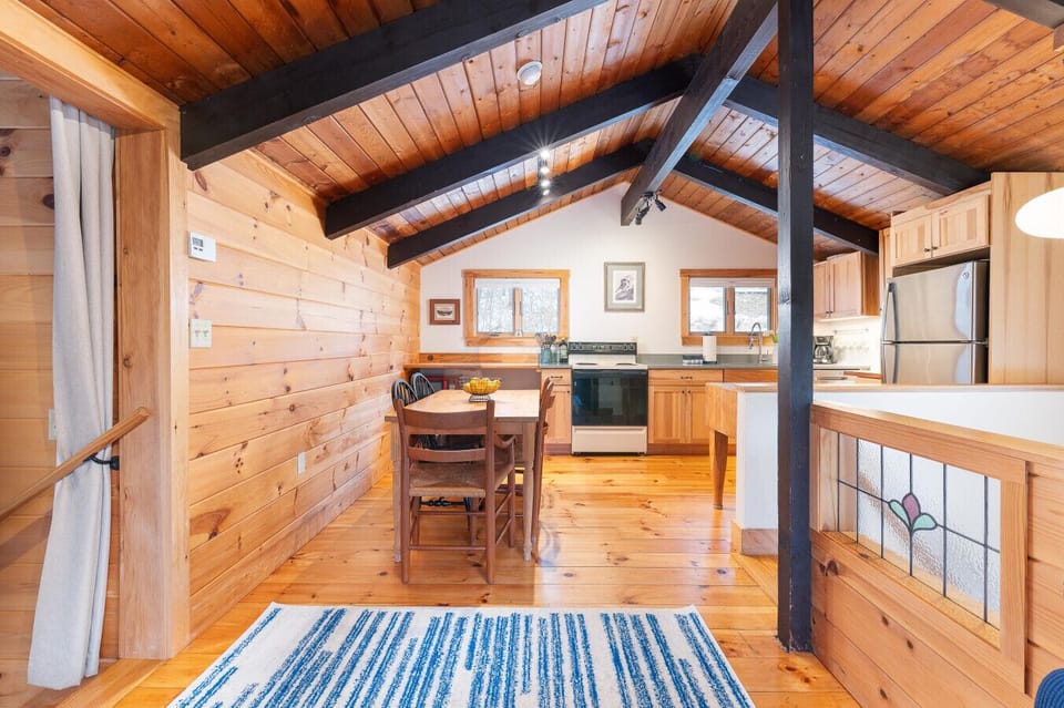 A warm and inviting dining area with a rustic wooden vibe.