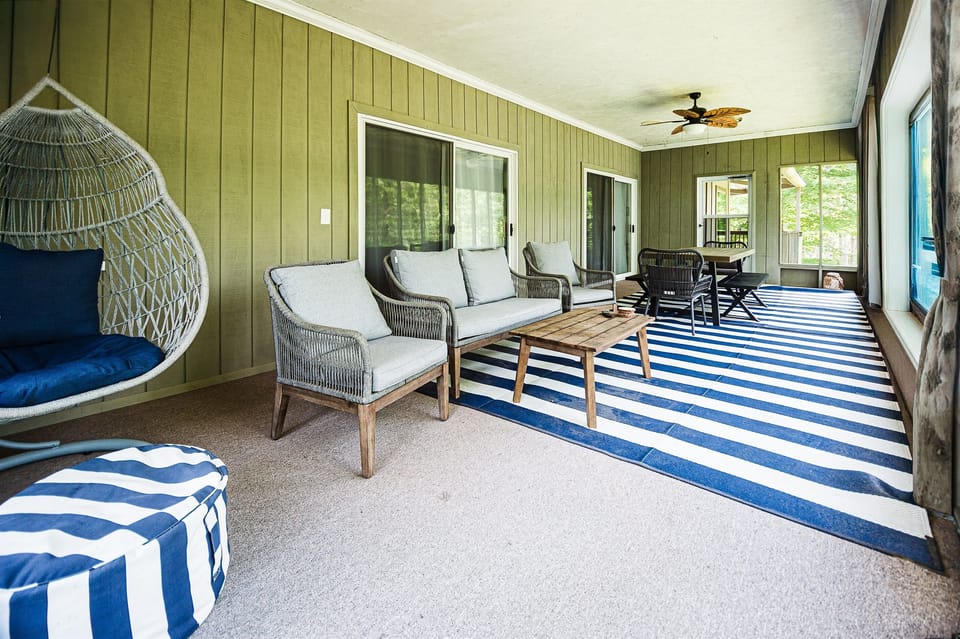 Lake views for days on this screened in porch