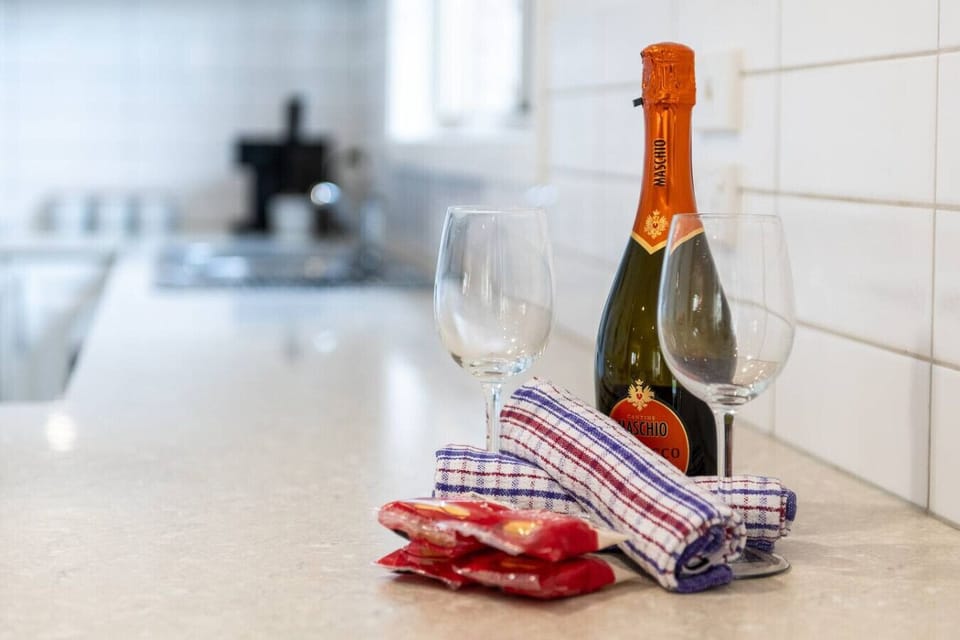 Enjoy a complimentary bottle of bubbles and a sweet treat.