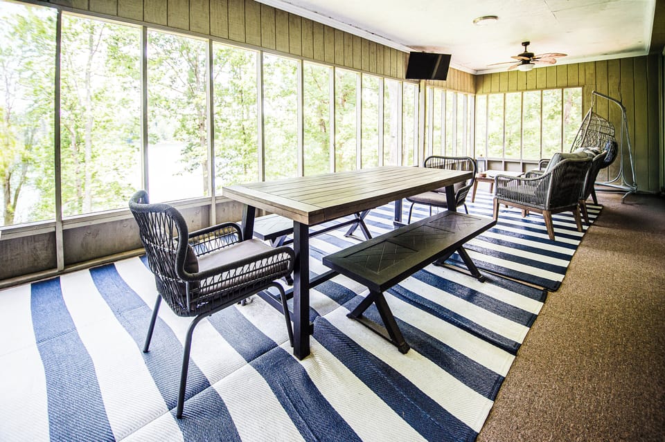Upstairs screened in porch is the icing on the cake for this property