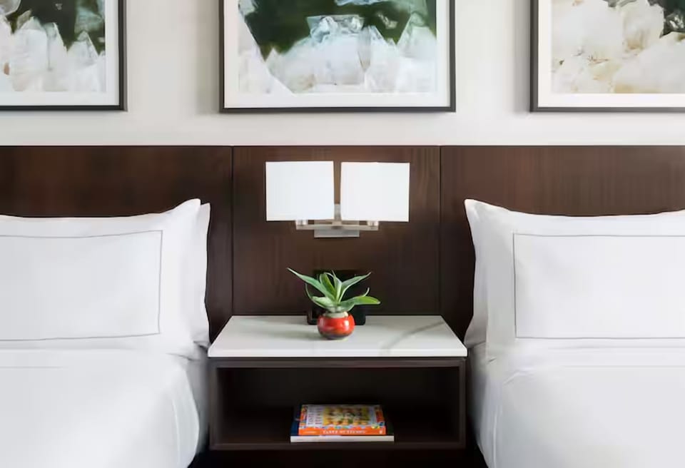 Wind down with warm bedside lighting and thoughtful finishing touches.