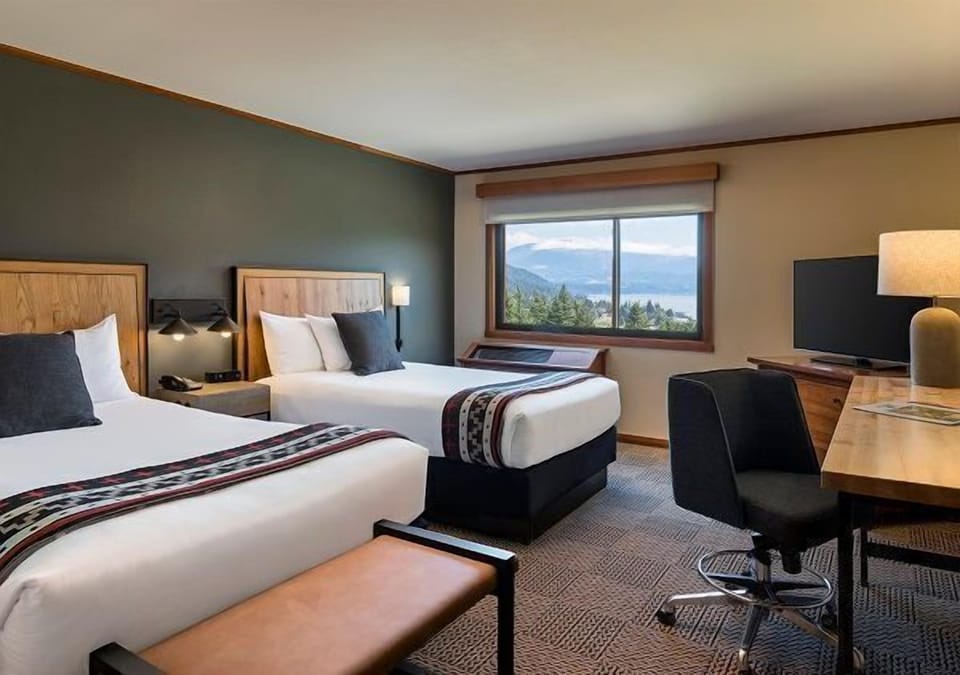 A bright, inviting space with ample natural light and soothing decor, offering comfort and peaceful views.