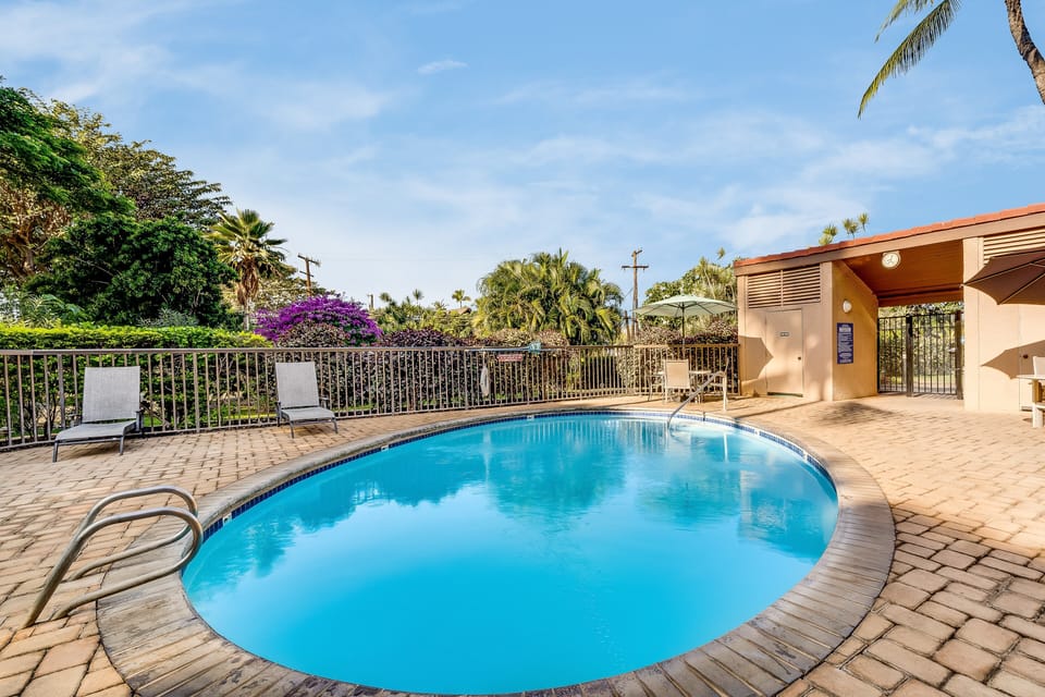 Cool Off in Paradise! Take a dip in the sparkling pool and enjoy the peaceful, well-maintained complex grounds