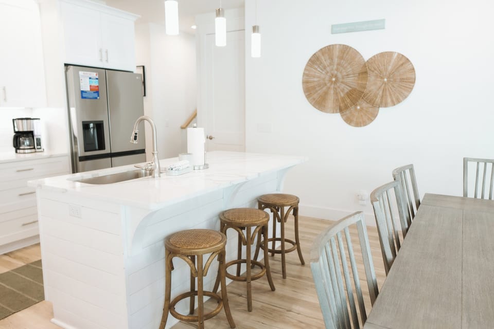 Barstool seating at the kitchen counter.