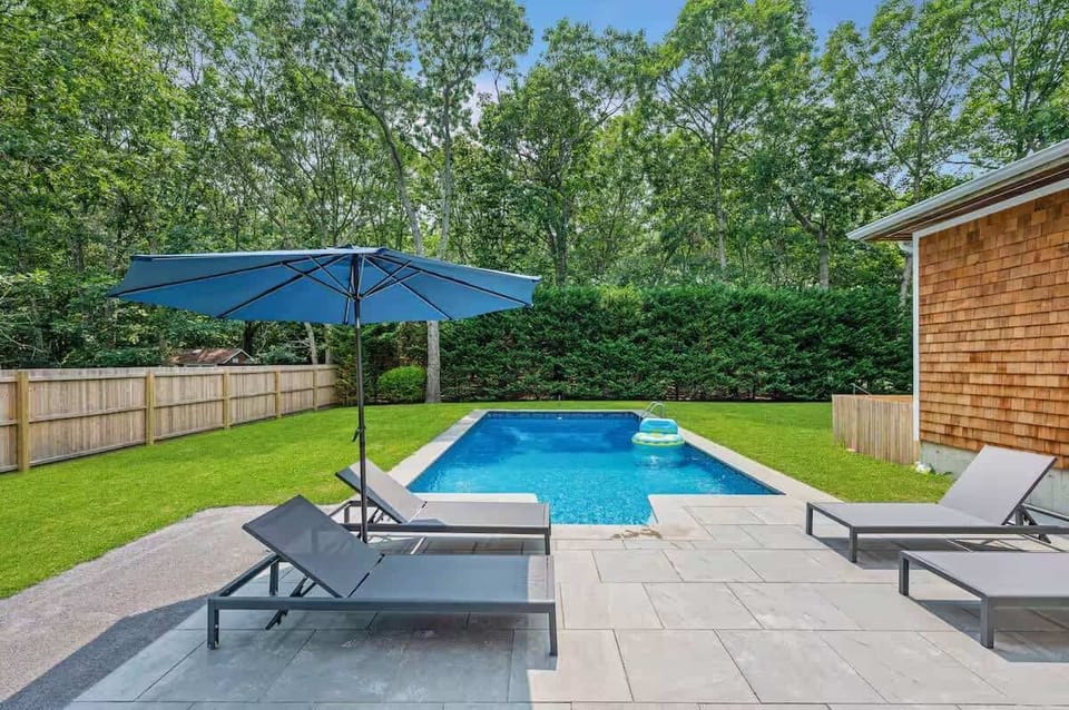 Relax poolside under the sun at your private oasis.