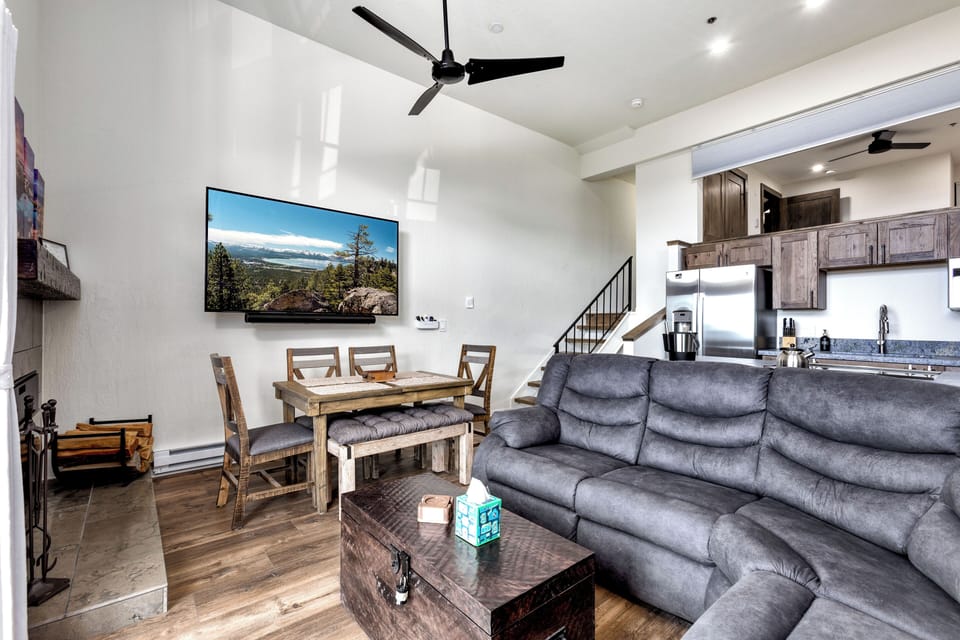 Open-concept living and dining area, perfect for relaxing after a day on the slopes.