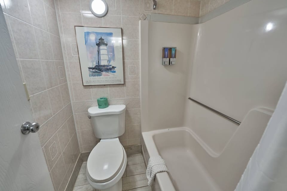 Rinse off in a clean tub-shower after a long day.