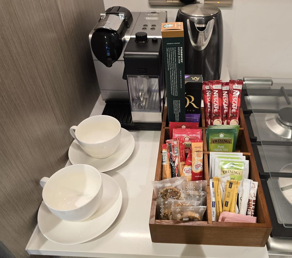 Fully stocked coffee and tea station, your perfect pick-me-up spot.
