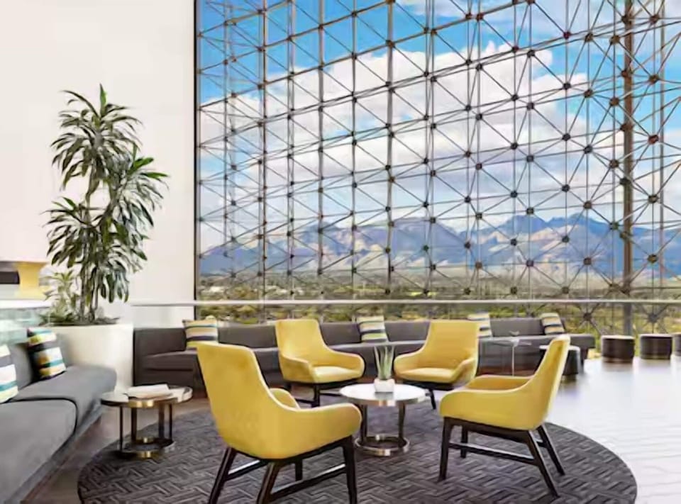 Unwind in designer seating while mountains frame your conversation.
