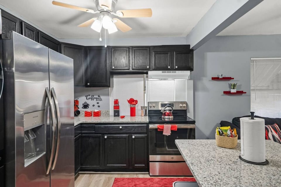 Culinary Comforts at Your Fingertips! Cook, clean, or caffeinate with ease in our fully equipped kitchen, complete with a cozy coffee station and laundry nook. Enjoy a quick snack on-the-go from the snack basket, on us!