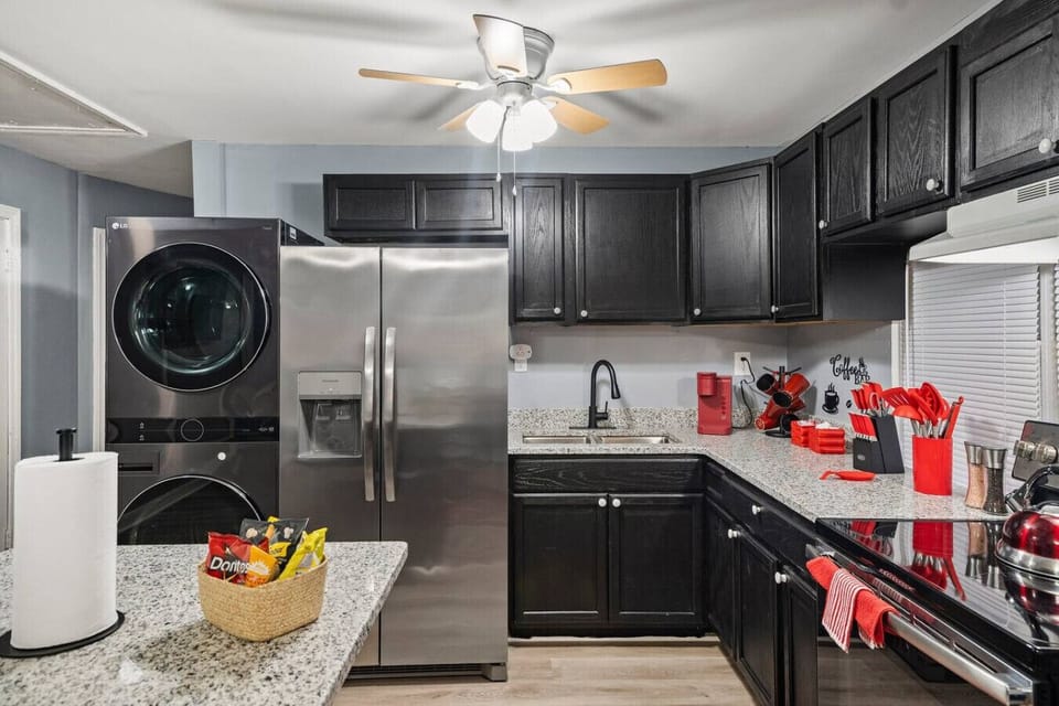 Culinary Comforts at Your Fingertips! Cook, clean, or caffeinate with ease in our fully equipped kitchen, complete with a cozy coffee station and laundry nook.