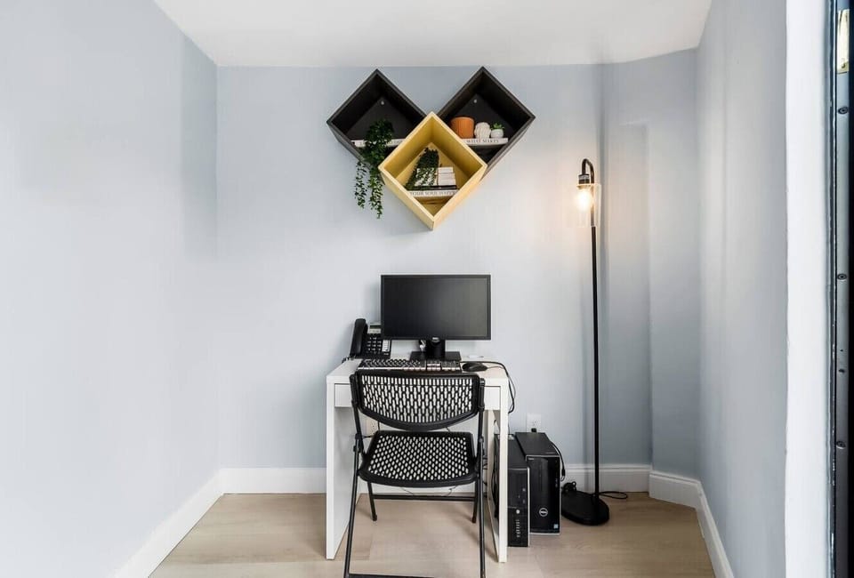 Dedicated workspace with desk and chair, ideal for remote work, digital nomads, business travelers, work-from-home stays, online meetings, laptop-friendly workspace, high-speed WiFi,
