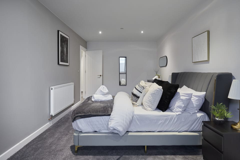 Your private retreat: a stylish double bedroom with a calm, welcoming feel.