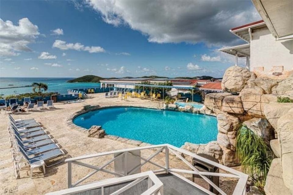Pool Area With Lounges