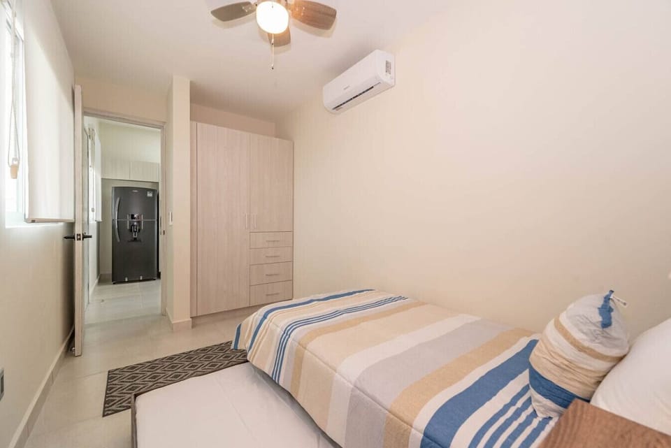 Rest, relax, and rejuvenate in this cozy bedroom, designed with your comfort in mind.