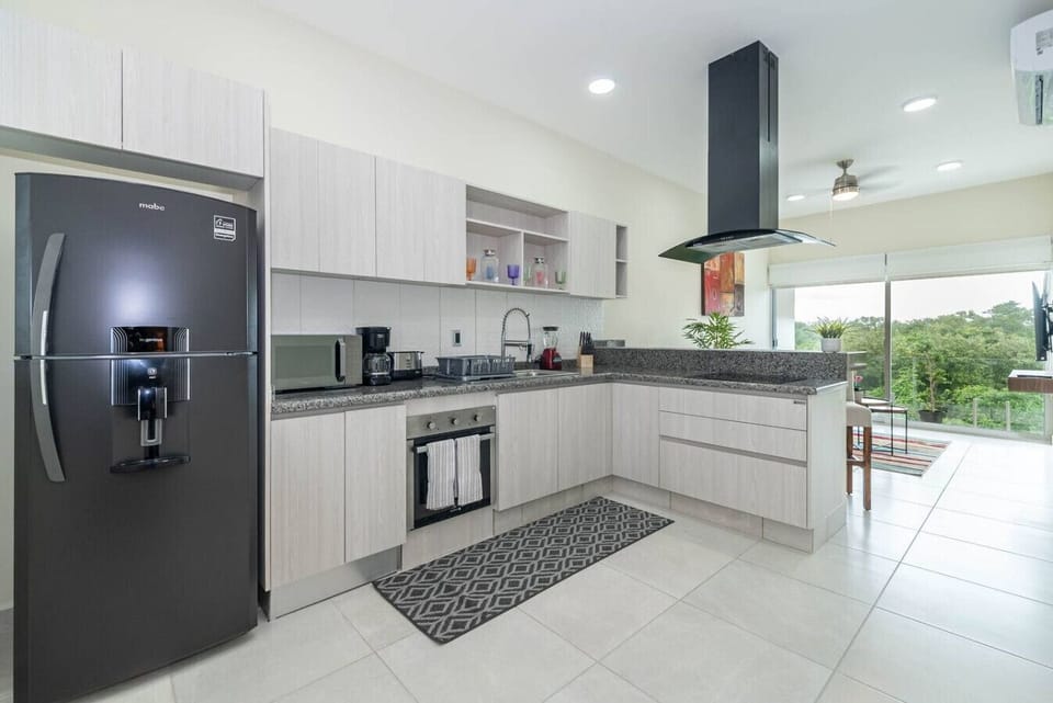 Cook up a feast or prepare a quick meal in this spacious, well-equipped kitchen designed for your convenience.