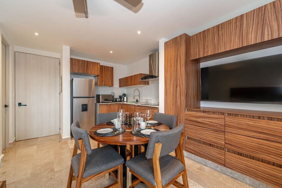 Dine in comfort and style in this bright, open dining area, designed for easy living.