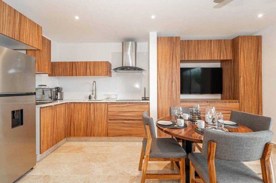 Dine in comfort and style in this bright, open dining area, designed for easy living.