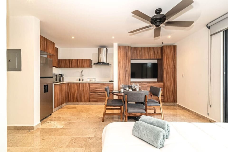 Dine in comfort and style in this bright, open dining area, designed for easy living.