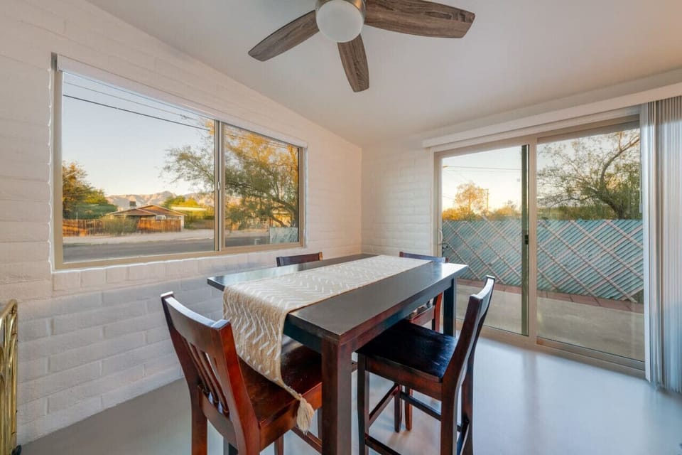 Unit A: Dining area with table that seats four