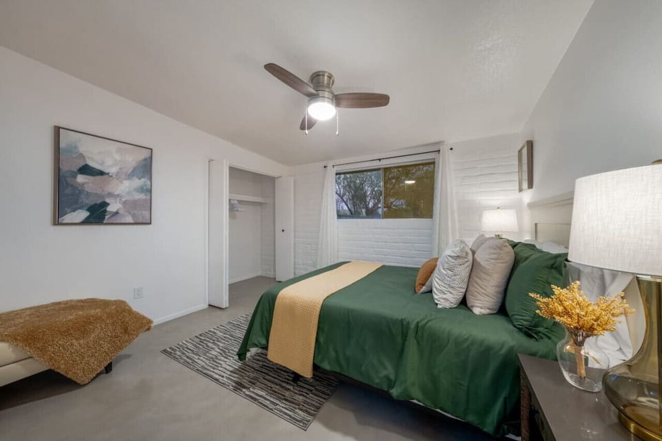 Unit B: Bedroom 2 with queen-size bed and closet