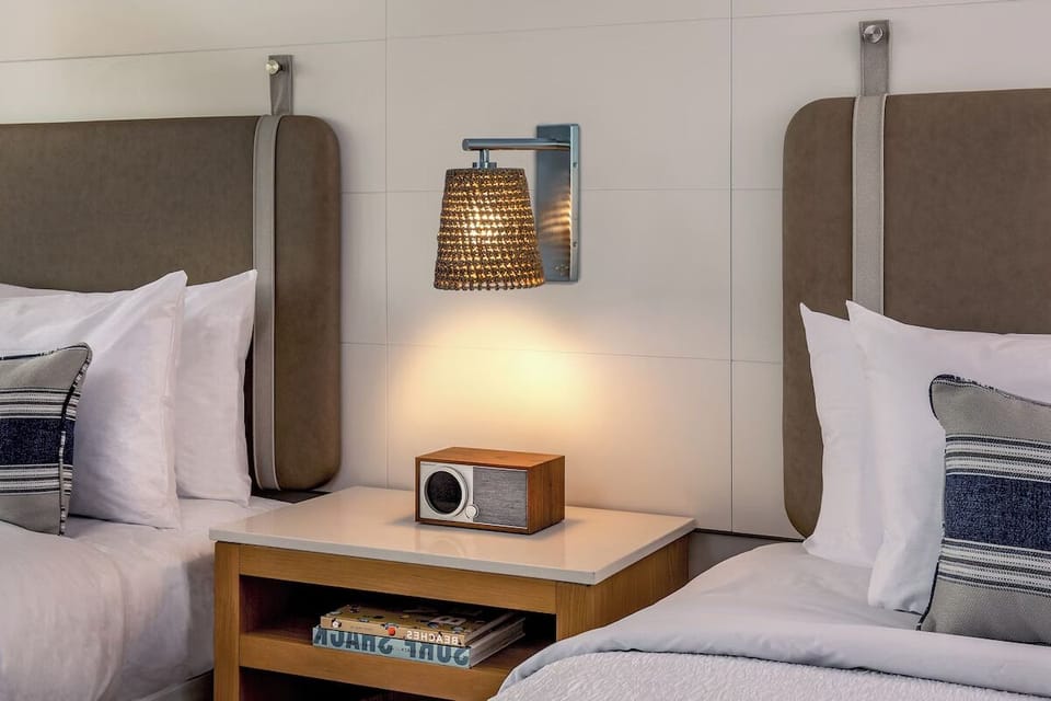 Unit with 2 Queen beds. Exact unit will be assigned upon arrival. Views, colors, and decor may vary.