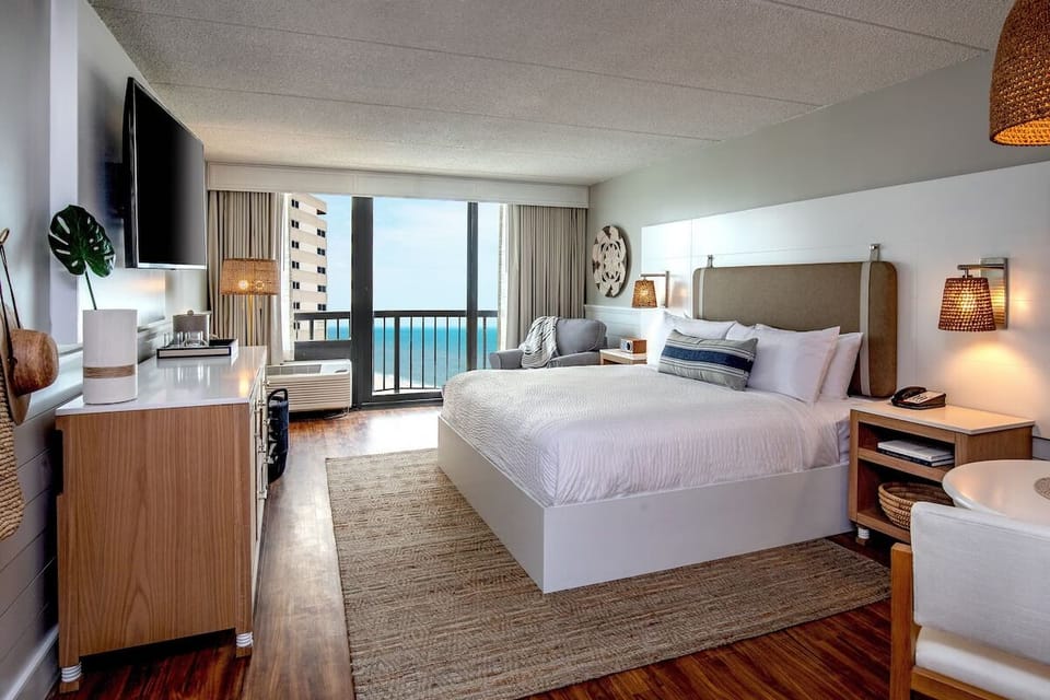 Unit with 1 King bed. Exact unit will be assigned upon arrival. Views, colors, and decor may vary.