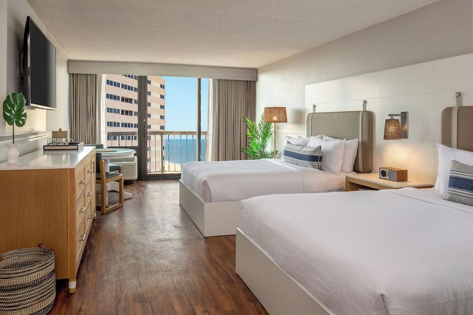 Unit with 2 Queen beds. Exact unit will be assigned upon arrival. Views, colors, and decor may vary.