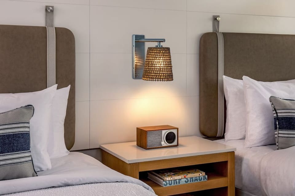 Unit with 2 Queen beds. Exact unit will be assigned upon arrival. Views, colors, and decor may vary.
