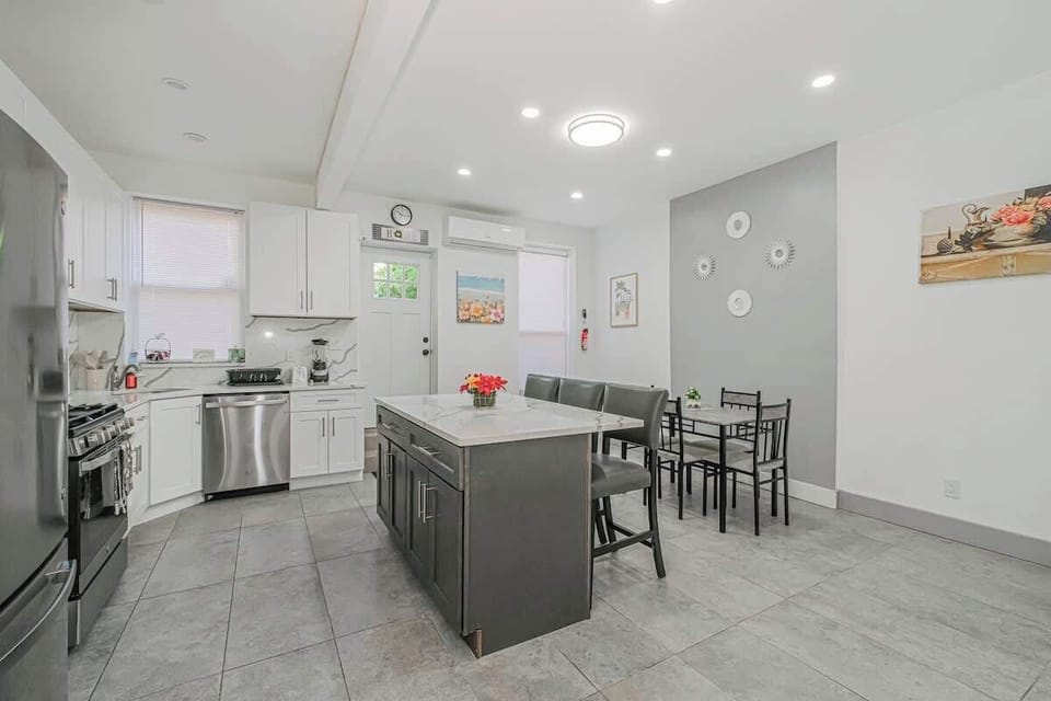 This modern kitchen is perfect for preparing home-cooked meals, offering all the tools and space you need.