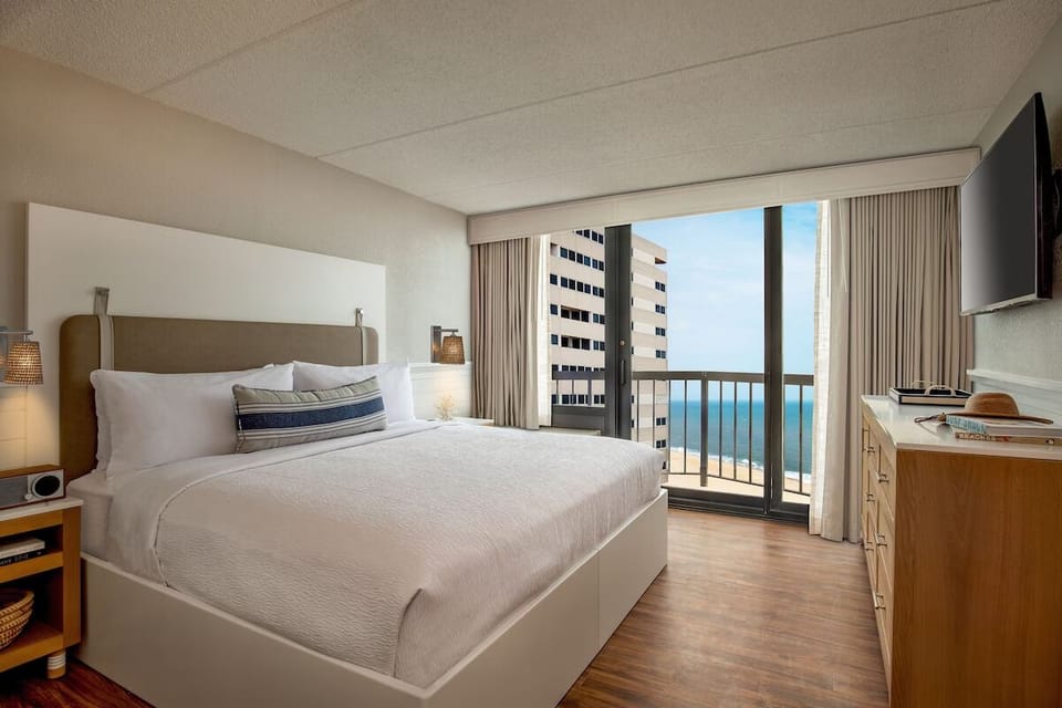 Unit with 1 King bed. Exact unit will be assigned upon arrival. Views, colors, and decor may vary.