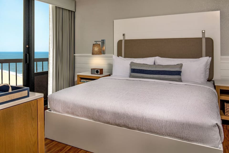 Unit with 1 King bed. Exact unit will be assigned upon arrival. Views, colors, and decor may vary.