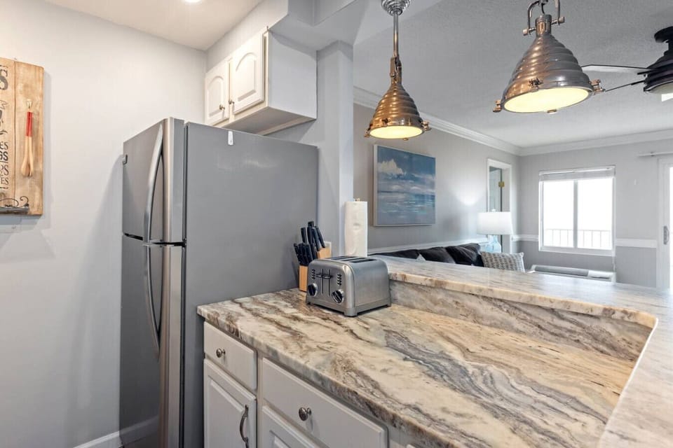 Create culinary memories in this full kitchen, thoughtfully designed for your convenience and comfort.