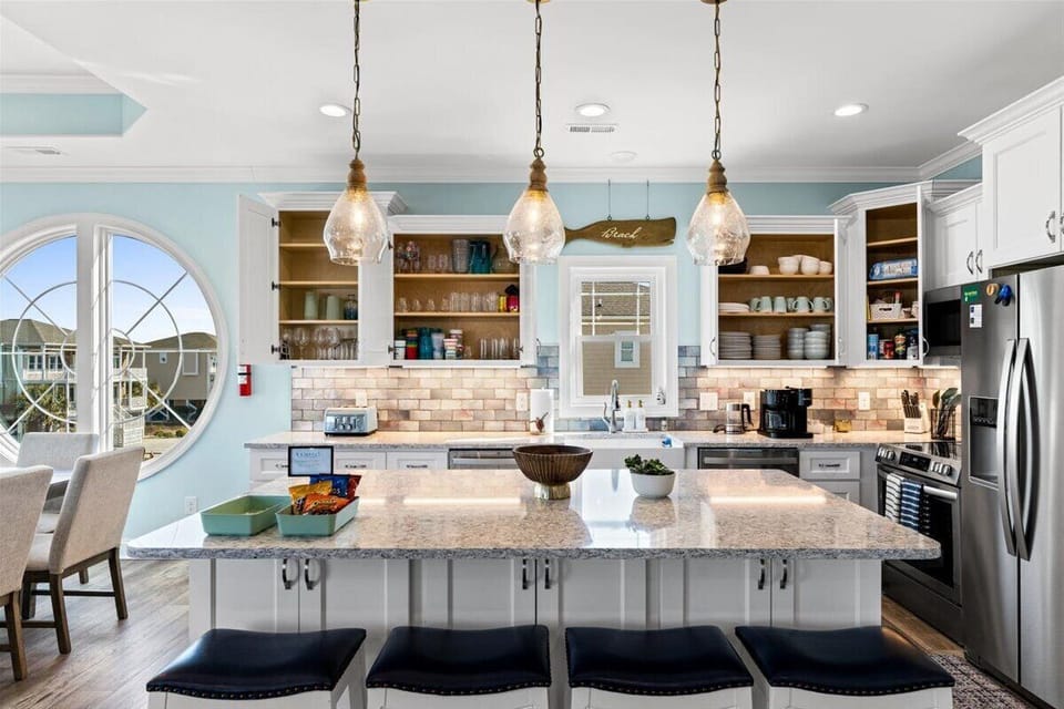Fully stocked chef's kitchen with 2 dishwashers