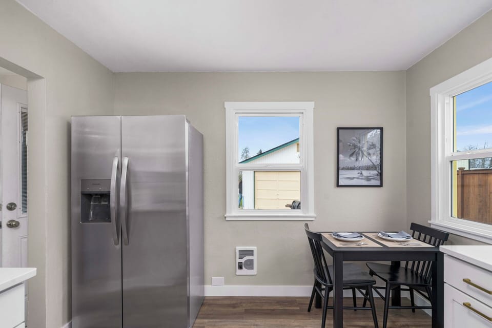 Plenty of space in the brand new refrigerator and we have a small dining table.