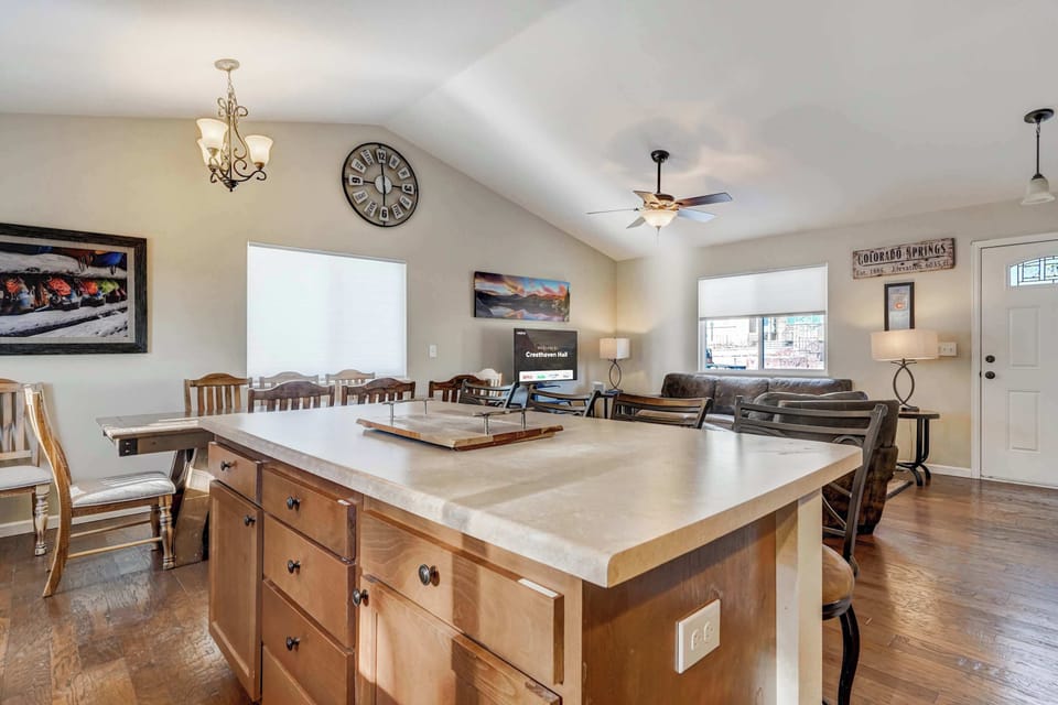 Cook and connect in this open-concept kitchen with plenty of counter space, modern appliances, and a seamless flow into the living and dining areas!