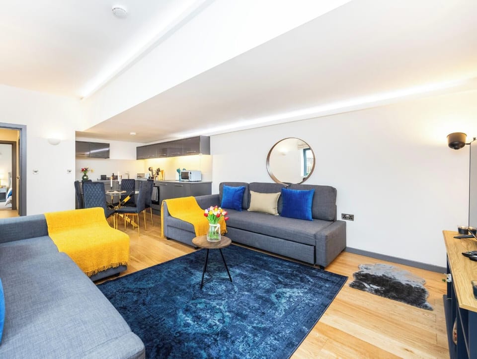 LIVING ROOM WITH DOUBLE SOFA BEDS