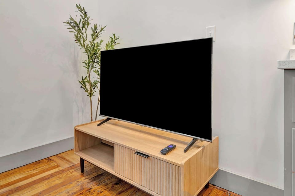 Living Room: Available TV perfect for your chill nights.